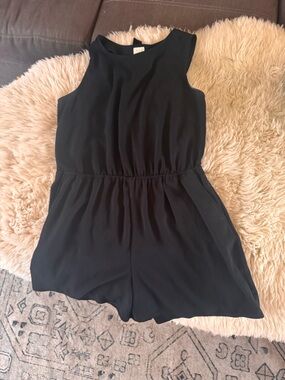 Black romper with peekaboo back detail